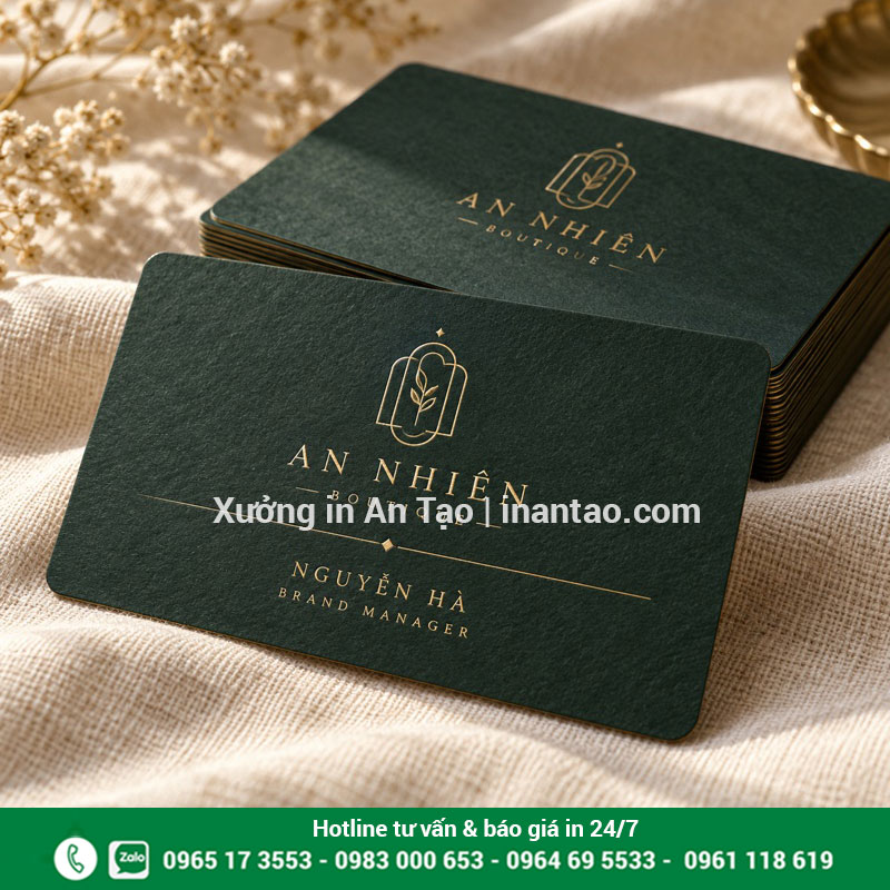 Danh thiếp An Nhiên Boutique màu xanh đậm với chữ ép kim và góc bo